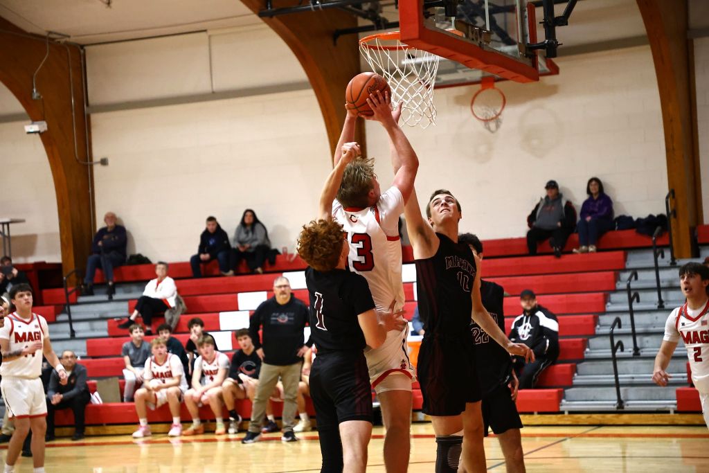 Colon boys fall to Comstock 70-53